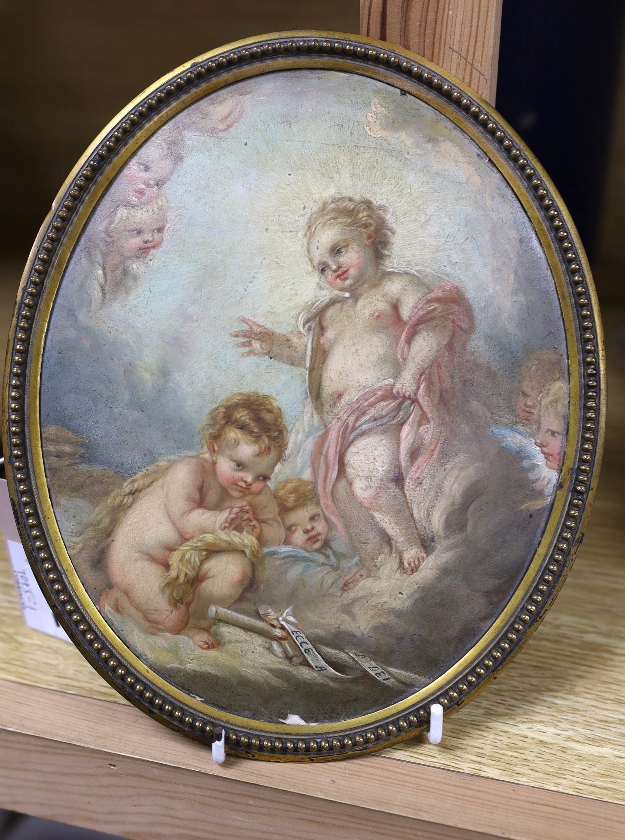 After Francois Boucher (French, 1703-1770) Celestial scene - The infant Jesus blessing St. John the Baptist, with a banner- ‘’Ecce Angus Dei’’ [Behold the Lamb of God] oil on canvas laid down21 x 17cm, framed to the oval